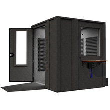 Load image into Gallery viewer, Angled right side view of the Audiology Ultra package by WhisperRoom, highlighting the double-wall sound booth's depth with open door and ADA-compliant design.