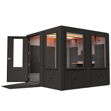Load image into Gallery viewer, Right side view of the Makerspace Booth with the door open, highlighting the ADA-friendly access, open interior space, visibility, and studio lighting.