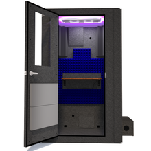 Load image into Gallery viewer, Front view of WhisperRoom's Voice Over Basic Package - a 4' x 4' single-wall vocal booth, showcasing its acoustic treatment, integrated desk, studio lighting, and additional features. The left-hinged door is open, revealing the interior adorned with vibrant blue StudioFoam.