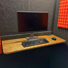 Load image into Gallery viewer, WhisperRoom's larger Office Desk shown with a monitor, keyboard, and mouse on its spacious surface.