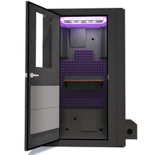 Load image into Gallery viewer, Front view of WhisperRoom's Voice Over Basic Package - a 4' x 4' single-wall vocal booth, thoughtfully equipped with acoustic treatment, a functional desk, studio lighting, and an array of premium features. The left-hinged door is open, revealing the interior accentuated with elegant purple StudioFoam, creating an inviting and professional recording environment.