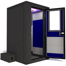 Load image into Gallery viewer, Side view of the WhisperRoom's Voice Over Deluxe Package - a 4' x 4' double-wall vocal booth, thoughtfully equipped with acoustic treatment, a functional desk, studio lighting, and an array of premium features. The right-hinged door is open, revealing the interior accentuated with vibrant blue StudioFoam, creating an ideal recording atmosphere.