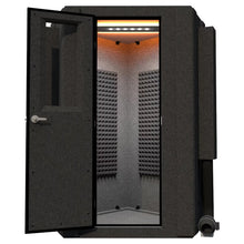 Load image into Gallery viewer, Interior view of the WhisperRoom MDL 127 LP S single-wall diamond-shaped soundproof booth, shown with the door open, acoustic foam panels installed on the angled walls, and overhead LED lighting.
