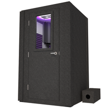 Load image into Gallery viewer, Frontal view of WhisperRoom&#39;s Voice Over Basic Package - a 4&#39; x 4&#39; single-wall vocal booth, meticulously equipped with acoustic treatment, a functional desk, studio lighting, and an array of premium features. The left-hinged door is closed, and the interior is adorned with elegant purple StudioFoam, creating an ideal recording environment.
