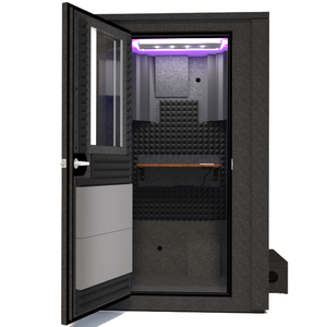 Frontal view of the WhisperRoom's Voice Over Deluxe Package - a 4' x 4' double-wall vocal booth, meticulously designed with acoustic treatment, a functional desk, studio lighting, and a comprehensive range of premium features. The left-hinged door is open, revealing the interior enhanced by sophisticated gray StudioFoam, creating an ideal recording environment.