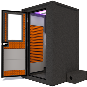 Side view of the WhisperRoom's Voice Over Deluxe Package - a 4' x 4' double-wall vocal booth, thoughtfully equipped with acoustic treatment, a functional desk, studio lighting, and an array of premium features. The left-hinged door is open, revealing the interior enhanced by vibrant orange StudioFoam, creating an ideal recording atmosphere.