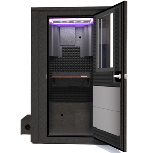 Frontal view of WhisperRoom's Voice Over Deluxe Package - a 4' x 4' double-wall vocal booth, meticulously designed with acoustic treatment, a functional desk, studio lighting, and a comprehensive range of premium features. The right-hinged door is open, revealing the interior enhanced by sophisticated gray StudioFoam, creating an ideal recording environment.